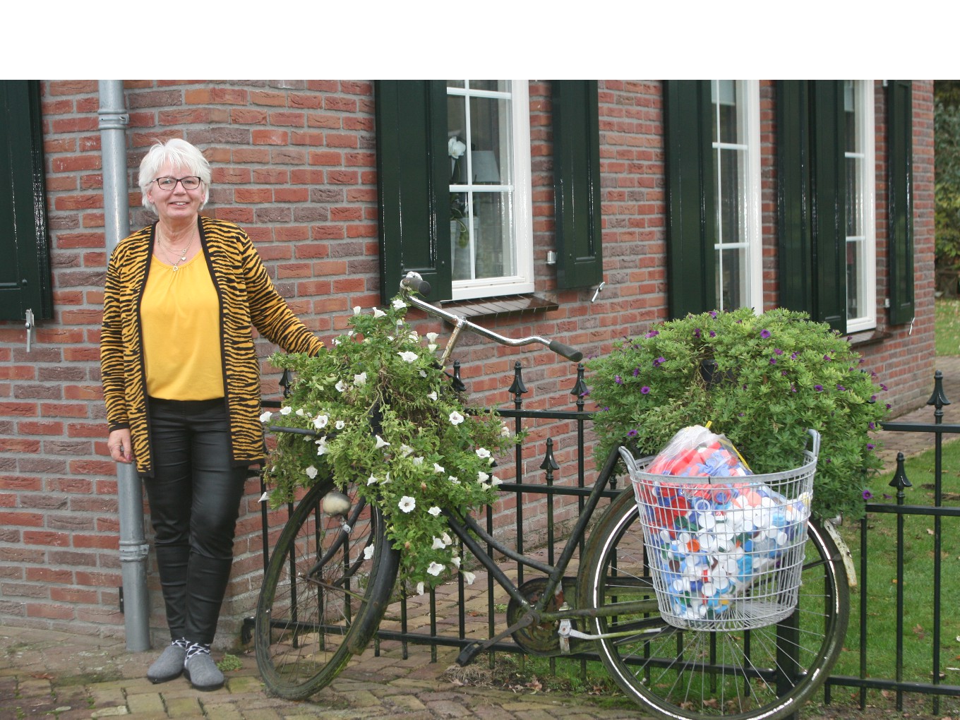 Plastic flessendoppen sparen voor een geleidehond